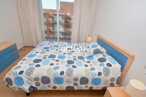 Postel nebo postele na pokoji v ubytování Catalunya C-3
