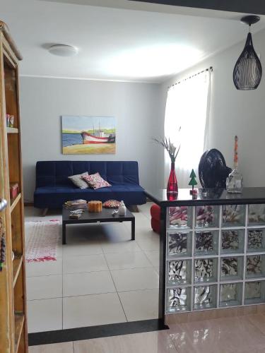 Ruang duduk di Casa da Lu Itacoatiara -Apartamento Costão