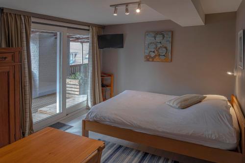 Postel nebo postele na pokoji v ubytování Hotel Piano 2 - Mont-St-Guibert - Louvain-la-Neuve