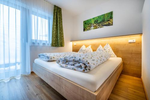 Posteľ alebo postele v izbe v ubytovaní WiWa Appartement