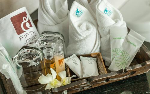 a basket filled with towels andentedentedentedentedented at Fifth Pattaya Jomtien By Shiwalai Int in Jomtien Beach