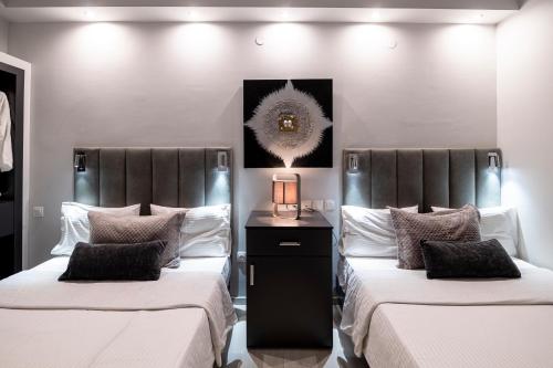 Postel nebo postele na pokoji v ubytování Lingos Hotel