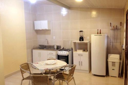 Η κουζίνα ή μικρή κουζίνα στο Kit 6 Residencial Diego Marcelo