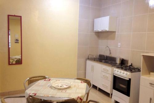 Kuchyň nebo kuchyňský kout v ubytování Kit 6 Residencial Diego Marcelo