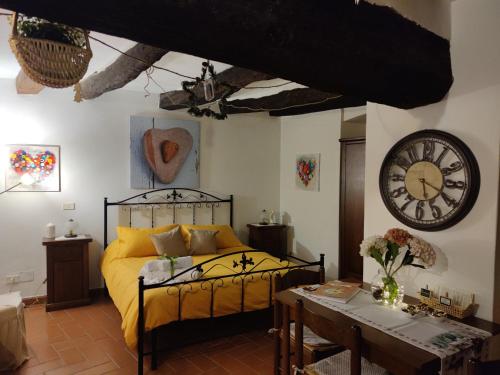 Ein Bett oder Betten in einem Zimmer der Unterkunft La Tana del Grillo