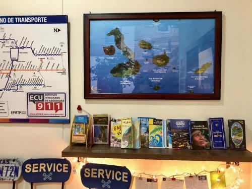 a shelf with a map on a wall at Quito Terrace in Quito