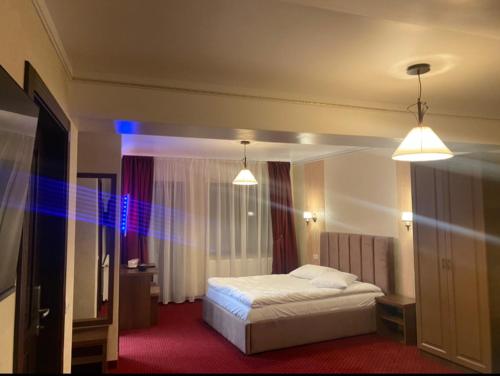 Postelja oz. postelje v sobi nastanitve Hotel Restaurant Alessia