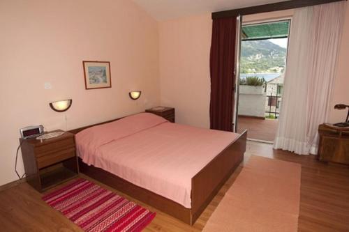 Postel nebo postele na pokoji v ubytování Apartment Durda2 - with sea view