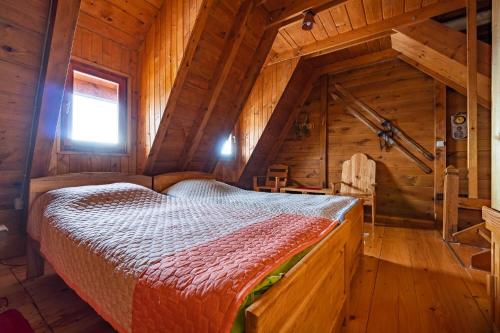 Ένα ή περισσότερα κρεβάτια σε δωμάτιο στο HostGost at Vila Zarić