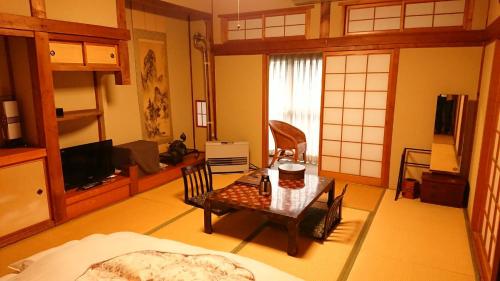 Posezení v ubytování Historical Ryokan SENYUKAN