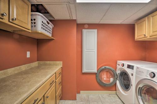 a laundry room with a washer and a washing machine at Family-Friendly Woodbury Home with Yard and Deck! in Woodbury