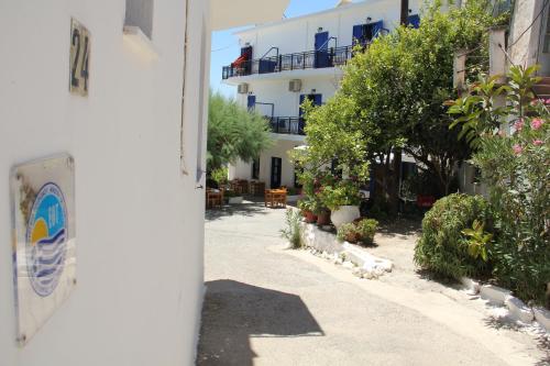 an alley with a building in the background at Hotel Stavris in Khóra Sfakíon