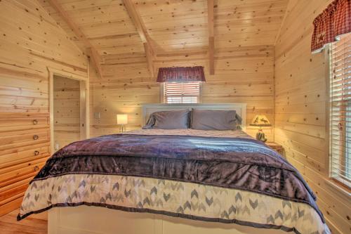 A bed or beds in a room at Cozy Augusta Cabin with Grill - Walk to Main St