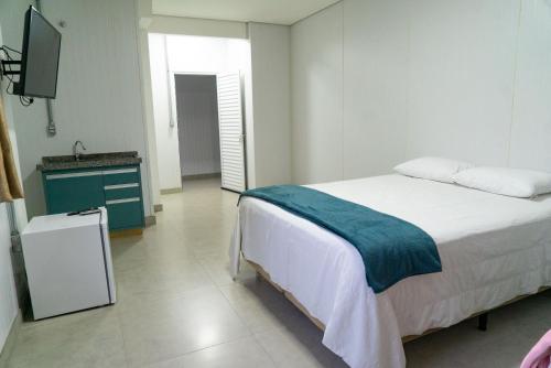 Cama ou camas em um quarto em Flat Central