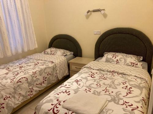Postel nebo postele na pokoji v ubytování Mariner Apartment