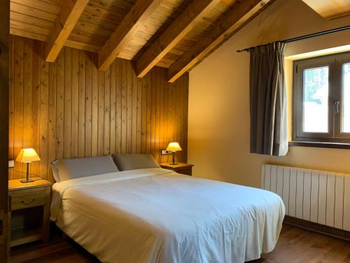 Postel nebo postele na pokoji v ubytování 3 Bedroom Duplex Apartment in La Molina