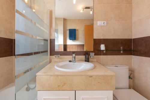 a bathroom with a sink and a toilet at Penthouse La Cala De Mijas in La Cala de Mijas