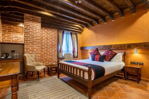 Postel nebo postele na pokoji v ubytování Basera Boutique Hotel
