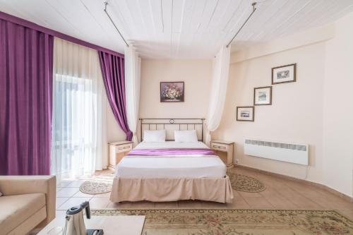 Katil atau katil-katil dalam bilik di Usadba Krugloye Ozero