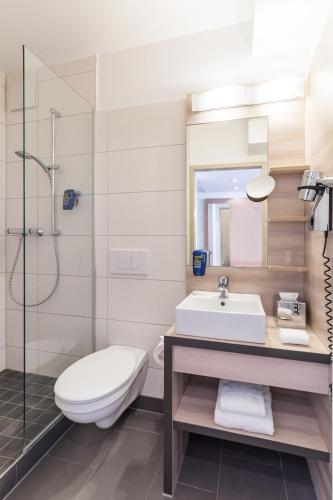 Salle de bains dans l'établissement Park Inn by Radisson Göttingen
