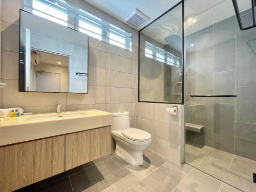 a bathroom with a toilet and a sink and a shower at LV Modern Suite Langkawi by Zervin in Kuah
