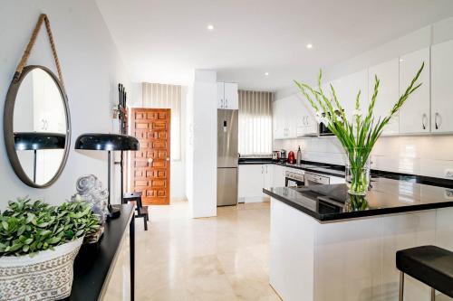 A kitchen or kitchenette at AS10 - Exclusive Apartment in Puerto B
