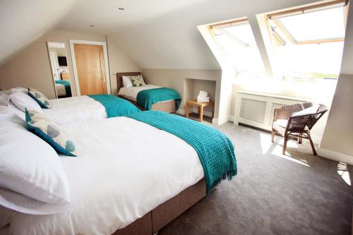 Un pat sau paturi într-o cameră la Cahermaclanchy House B&B
