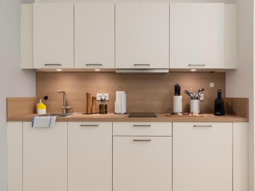 Kuchyň nebo kuchyňský kout v ubytování limehome Gütersloh Eickhoffstraße