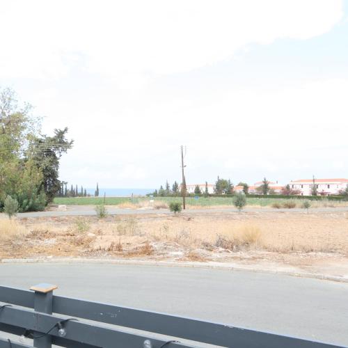 a bench sitting on the side of a road at The Summer Haven in Polis Chrysochous