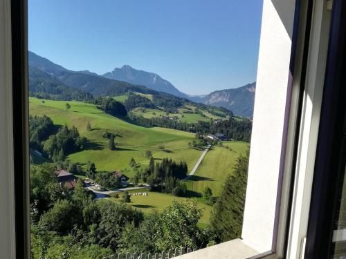 a view of a valley from a window at Familienbauernhof Imitz, Ferienwohnung in Spital am Pyhrn
