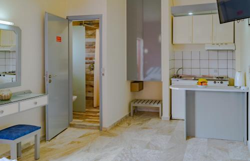a kitchen with a sink and a counter top at Saint Trope Studios in Kalamaki Chanion