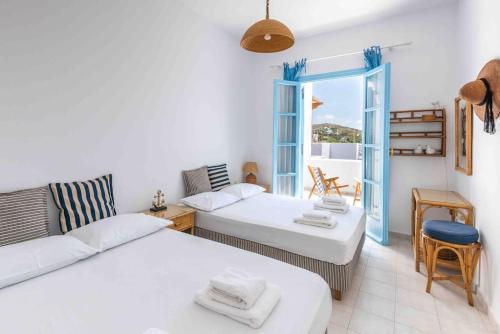 Voodi või voodid majutusasutuse Traditional Two Story House in Galanado Naxos toas
