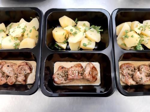 four plastic containers filled with different types of food at Penzion a Restaurace Belveder Romantico, Mini-zoo, Free parking in Jáchymov