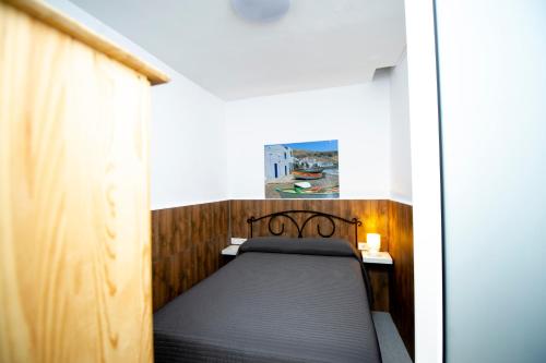 Postel nebo postele na pokoji v ubytování POZO NEGRO SEA