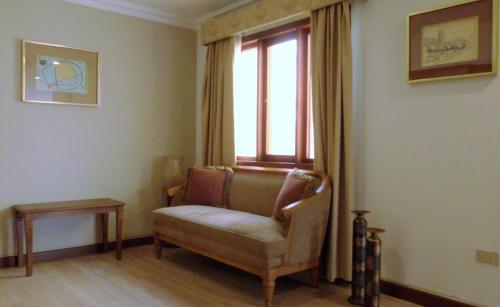Χώρος καθιστικού στο Hotel El Conquistador