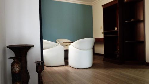 Χώρος καθιστικού στο Hotel El Conquistador