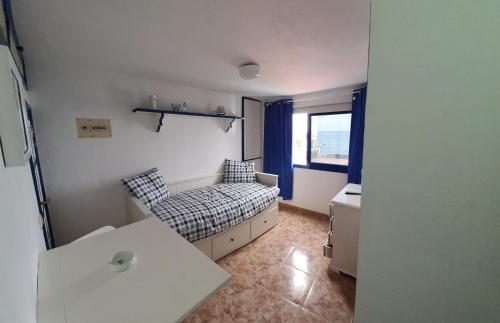Ένα ή περισσότερα κρεβάτια σε δωμάτιο στο Relaxlanzarote