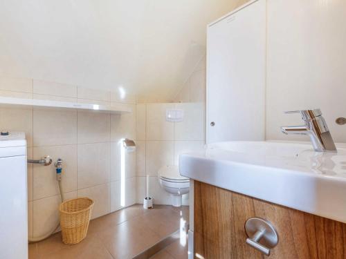 Ένα μπάνιο στο Ferienwohnung Fährmann