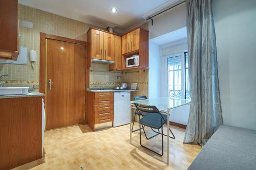 Cucina o angolo cottura di Apartamentos Madrid Atocha