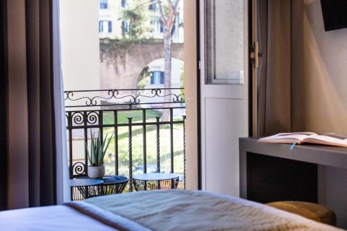 Ένα ή περισσότερα κρεβάτια σε δωμάτιο στο The Cross Hotel