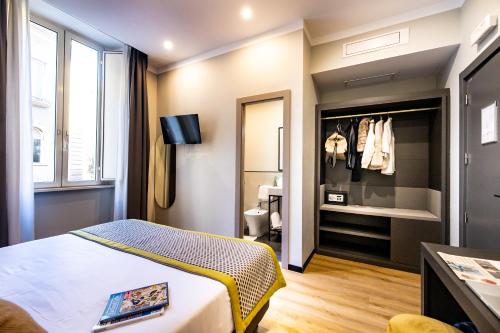 Ένα ή περισσότερα κρεβάτια σε δωμάτιο στο The Cross Hotel