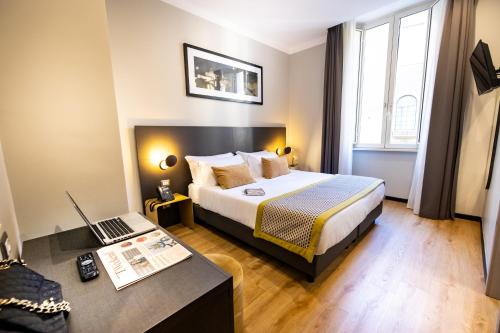 Ένα ή περισσότερα κρεβάτια σε δωμάτιο στο The Cross Hotel