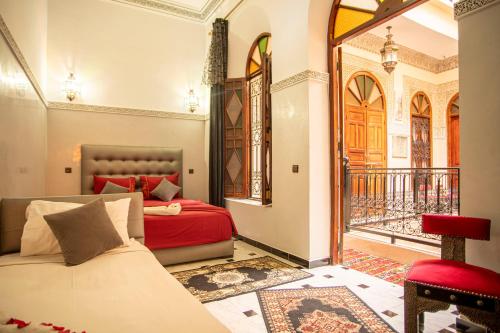 Un ou plusieurs lits dans un hébergement de l'établissement Riad Aymane