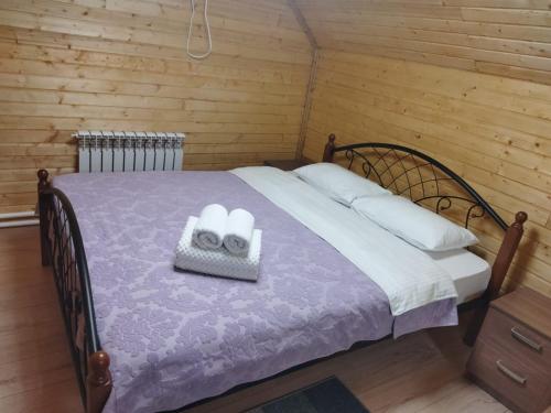 Eco hotel & restaurant "SKALA" tesisinde bir odada yatak veya yataklar