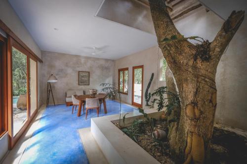 Jardin de l'établissement Wakax Hacienda - Cenote & Boutique Hotel - Small Luxury Hotels of the World