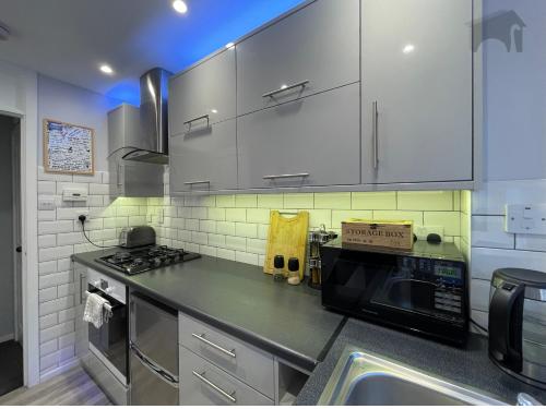 Kuchyň nebo kuchyňský kout v ubytování Highfield apartment