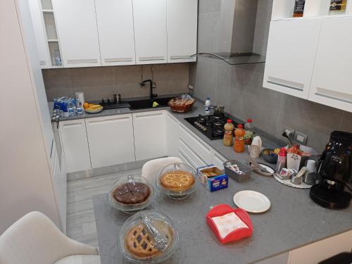 a kitchen with a counter with some food on it at B&B Albachiara in Senise