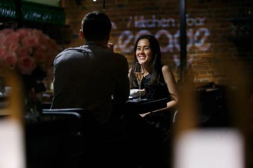 a man and a woman sitting at a table at WineWood Moscow in Moscow