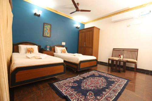 Katil atau katil-katil dalam bilik di Hotel BAY TREASURE