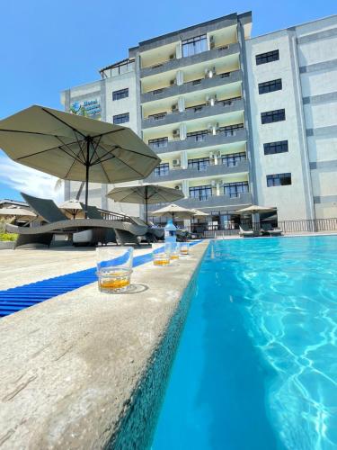 Bazén v ubytování Hotel Comster Mtwapa nebo v jeho okolí